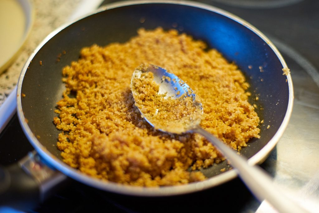 Breadcrumbs in a pan.