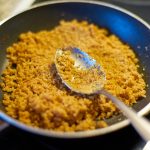 Breadcrumbs in a pan.